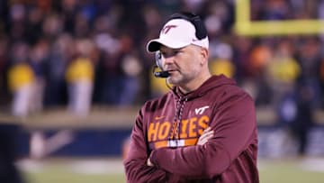CHARLOTTESVILLE, VA - NOVEMBER 24: Head coach Justin Fuente of the Virginia Tech Hokies watches a play in the third quarter during a game against the Virginia Cavaliers at Scott Stadium on November 24, 2017 in Charlottesville, Virginia. Virginia Tech defeated Virginia 10-0. (Photo by Ryan M. Kelly/Getty Images)