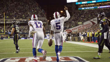 Nov 7, 2016; Seattle, WA, USA; Buffalo Bills quarterback Tyrod Taylor (5) celebrates after scoring a touchdown during the first quarter in a game against the Seattle Seahawks at CenturyLink Field. Mandatory Credit: Troy Wayrynen-USA TODAY Sports