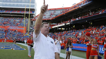 Sep 10, 2016; Gainesville, FL, USA; Florida Gators head coach Jim McElwain celebrates after they beat the Kentucky Wildcats at Ben Hill Griffin Stadium. Florida Gators defeated the Kentucky Wildcats 45-7. Mandatory Credit: Kim Klement-USA TODAY Sports