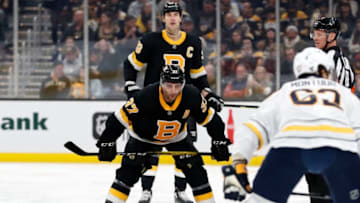 BOSTON, MA - DECEMBER 29: Boston Bruins center Patrice Bergeron (37) eyes the opposition during a game between the Boston Bruins and the Buffalo Sabres on December 29, 2019, at TD Garden in Boston, Massachusetts. (Photo by Fred Kfoury III/Icon Sportswire via Getty Images)