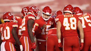 KANSAS CITY, MISSOURI - DECEMBER 06: Patrick Mahomes #15 of the Kansas City Chiefs stands in the huddle during the second quarter of a game against the Denver Broncos at Arrowhead Stadium on December 06, 2020 in Kansas City, Missouri. (Photo by Jamie Squire/Getty Images)