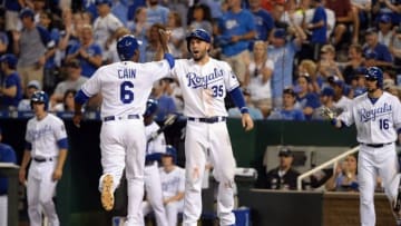 Jun 18, 2016; Kansas City, MO, USA; Kansas City Royals center fielder Lorenzo Cain (6) celebrates with first baseman Eric Hosmer (35) after scoring against the Detroit Tigers in the eighth inning at Kauffman Stadium. Kansas City won 16-5. Mandatory Credit: John Rieger-USA TODAY Sports