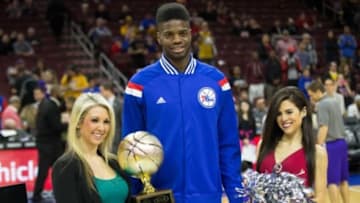 Mar 30, 2015; Philadelphia, PA, USA; Philadelphia 76ers center Nerlens Noel (4) is honored as the march player of the month prior to a game against the Los Angeles Lakers at Wells Fargo Center. The Lakers won 113-111 in overtime. Mandatory Credit: Bill Streicher-USA TODAY Sports