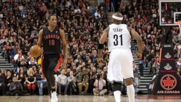 Jan 11, 2014; Toronto, Ontario, CAN; Toronto Raptors shooting guard DeMar DeRozan (10) takes the ball up court as Brooklyn Nets shooting guard Jason Terry (31) tries to defend during the 4th quarter in a game at the Air Canada Centre. Mandatory Credit: Nick Turchiaro-USA TODAY Sports The Toronto Raptors won 96-80.
