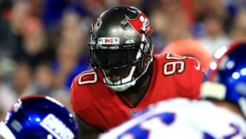 TAMPA, FLORIDA - NOVEMBER 22: Jason Pierre-Paul #90 of the Tampa Bay Buccaneers looks on during the first half of the game against the New York Giants at Raymond James Stadium on November 22, 2021 in Tampa, Florida. (Photo by Mike Ehrmann/Getty Images)