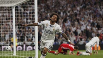 MADRID, SPAIN - APRIL 18: Marcelo of Madrid celebrate a goal from Cristiano Ronaldo of Real Madrid during the UEFA Champions League Quarter Final second leg match between Real Madrid CF and FC Bayern Muenchen at Estadio Santiago Bernabeu on April 18, 2017 in Madrid, Spain. (Photo by TF-Images/Getty Images)