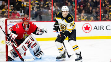 OTTAWA, ON - NOVEMBER 27: Boston Bruins Left Wing Jake DeBrusk (74) sets up in front of Ottawa Senators Goalie Anders Nilsson (31) during third period National Hockey League action between the Boston Bruins and Ottawa Senators on November 27, 2019, at Canadian Tire Centre in Ottawa, ON, Canada. (Photo by Richard A. Whittaker/Icon Sportswire via Getty Images)