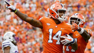 CLEMSON, SC - SEPTEMBER 01: Wide receiver Diondre Overton #14 of the Clemson Tigers celebrates with wide receiver Cornell Powell #17 after catching a touchdown pass against the Furman Paladins during the second quarter of the football game at Clemson Memorial Stadium on September 1, 2018 in Clemson, South Carolina. (Photo by Mike Comer/Getty Images)