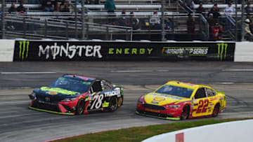 MARTINSVILLE, VA - OCTOBER 28: Joey Logano, driver of the #22 Shell Pennzoil Ford, races Martin Truex Jr., driver of the #78 5-hour ENERGY/Bass Pro Shops Toyota, in the finals laps of the Monster Energy NASCAR Cup Series First Data 500 at Martinsville Speedway on October 28, 2018 in Martinsville, Virginia. (Photo by Jared C. Tilton/Getty Images)