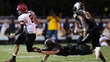 Muscle Shoals' Logan Smothers (8) carries against Wetumpka at Hohenberg Stadium in Wetumpka, Ala., on Friday October 25, 2019.Wet14