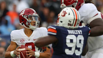AUBURN, ALABAMA - NOVEMBER 27: Bryce Young #9 of the Alabama Crimson Tide looks to pass against the Auburn Tigers during the first half at Jordan-Hare Stadium on November 27, 2021 in Auburn, Alabama. (Photo by Kevin C. Cox/Getty Images)