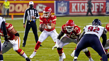 Sep 10, 2020; Kansas City, Missouri, USA; Kansas City Chiefs quarterback Patrick Mahomes (15) takes a snap during the first half against the Houston Texans at Arrowhead Stadium. Mandatory Credit: Denny Medley-USA TODAY Sports