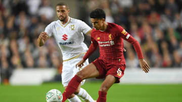 MILTON KEYNES, ENGLAND - SEPTEMBER 25: Jordan Bowery of MK Dons looks on as Ki-Jana Hoever of Liverpool controls the ball during the Carabao Cup Third Round match between Milton Keynes Dons and Liverpool FC at Stadium MK on September 25, 2019 in Milton Keynes, England. (Photo by Laurence Griffiths/Getty Images)