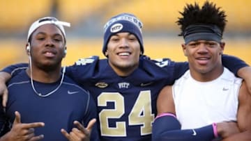 Oct 29, 2015; Pittsburgh, PA, USA; Pittsburgh Panthers running back Qadree Ollison (left) and running back James Conner (24) and linebacker Jamal Davis (right) pose for a photo before playing the North Carolina Tar Heels at Heinz Field. Mandatory Credit: Charles LeClaire-USA TODAY Sports