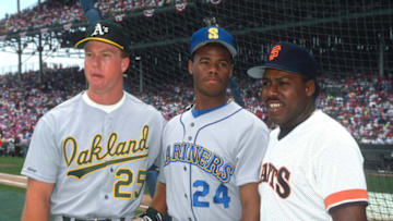CHICAGO-July 10,1990: Mark McGwire of the Oakland A's, Ken Griffey Jr. of the Seattle Mariners, and Kevin Mitchell of the San Francisco Giants pose before the 1990 MLB All Star game at Wrigley Field in Chicago, Illinois. McGwire played for the Oakland A.s from 1986-1997. Griffey played for the Seattle Mariners from 1989-1997 & 2009-2010. Mitchell played for the San Francisco Giants from 1987-1992. (Photo by Ron Vesely/MLB Photos via Getty Images)