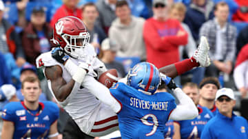 Linebacker Najee Stevens-McKenzie #9 of Kansas football breaks up a pass. (Photo by Jamie Squire/Getty Images)