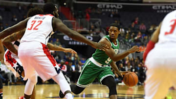 Nov 9, 2016; Washington, DC, USA; Boston Celtics guard Demetrius Jackson (9) dribbles as Washington Wizards forward Daniel Ochefu (32) defends during the second half at Verizon Center. Mandatory Credit: Brad Mills-USA TODAY Sports