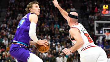 SALT LAKE CITY, UTAH - NOVEMBER 28: Lauri Markkanen #23 of the Utah Jazz looks to shoot over Alex Caruso #6 of the Chicago Bulls during the second half of a game at Vivint Arena on November 28, 2022 in Salt Lake City, Utah. NOTE TO USER: User expressly acknowledges and agrees that, by downloading and or using this photograph, User is consenting to the terms and conditions of the Getty Images License Agreement. (Photo by Alex Goodlett/Getty Images)