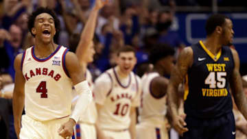 LAWRENCE, KS - FEBRUARY 13: Devonte' Graham