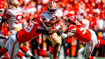 KANSAS CITY, MO - SEPTEMBER 23: Alfred Morris #46 of the San Francisco 49ers tries to run through the tackle of Reggie Ragland #59 and Tanoh Kpassagnon #92 of the Kansas City Chiefs during the third quarter of the game at Arrowhead Stadium on September 23rd, 2018 in Kansas City, Missouri. (Photo by David Eulitt/Getty Images)