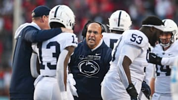 Nov 6, 2021; College Park, Maryland, USA; Penn State Nittany Lions head coach James Franklin speaks withwide receiver KeAndre Lambert-Smith (13) on the sidelines during the second half against the Maryland Terrapins at Capital One Field at Maryland Stadium. Mandatory Credit: Tommy Gilligan-USA TODAY Sports