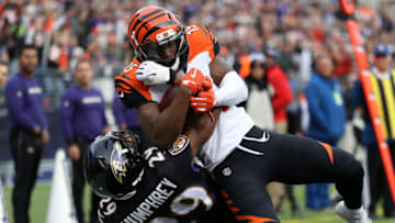 BALTIMORE, MD - NOVEMBER 18: Wide Receiver John Ross #15 of the Cincinnati Bengals catches a touchdown as he is tackled by cornerback Marlon Humphrey #29 of the Baltimore Ravens in the third quarter at M&T Bank Stadium on November 18, 2018 in Baltimore, Maryland. (Photo by Rob Carr/Getty Images)