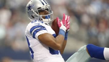 Oct 5, 2014; Arlington, TX, USA; Dallas Cowboys wide receiver Terrance Williams (83) catches a touchdown pass in the third quarter against the Houston Texans at AT&T Stadium. Mandatory Credit: Tim Heitman-USA TODAY Sports