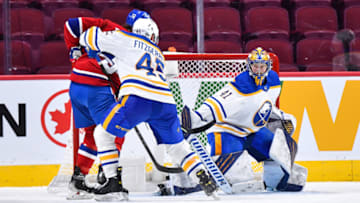 MONTREAL, QC - FEBRUARY 13: Craig Anderson #41 of the Buffalo Sabres tends net during the third period against the Montreal Canadiens at Centre Bell on February 13, 2022 in Montreal, Canada. The Buffalo Sabres defeated the Montreal Canadiens 5-3. (Photo by Minas Panagiotakis/Getty Images)