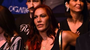 PHOENIX, AZ - DECEMBER 13: Cristiane 'Cyborg' Justino sits Octagonside during the UFC Fight Night event at the U.S. Airways Center on December 13, 2014 in Phoenix, Arizona. (Photo by Josh Hedges/Zuffa LLC/Zuffa LLC via Getty Images)