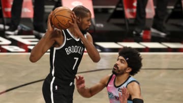 Kevin Durant #7 of the Brooklyn Nets in action against Gabe Vincent #2 of the Miami Heat(Photo by Jim McIsaac/Getty Images)