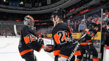PHILADELPHIA, PA - FEBRUARY 09: Carter Hart #79 and Claude Giroux #28 of the Philadelphia Flyers shake hands following a 6-2 win against the Anaheim Ducks on February 9, 2019 at the Wells Fargo Center in Philadelphia, Pennsylvania. (Photo by Len Redkoles/NHLI via Getty Images)