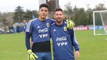 Argentina U17 and Atlanta United goalkeeper Rocco Rios Novo poses with Lionel Messi in Ezeiza, Argentina. (Photo by Gustavo Pagano/Getty Images)