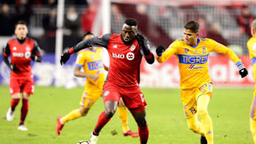TORONTO, ON - MARCH 07: Jozy Altidore (17) of Toronto FC dribbles the ball away from Larry Vásquez (19) of Tigres UANL during the first half of the CONCACAF Champions League Quarter-final match between Toronto FC and Tigres UANL on March 7, 2018, at BMO Field in Toronto, ON, Canada. (Photograph by Julian Avram/Icon Sportswire via Getty Images)