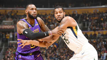 LOS ANGELES, CA - NOVEMBER 23: LeBron James #23 of the Los Angeles Lakers and Derrick Favors #15 of the Utah Jazz jocks for a position during the game on November 23, 2018 at STAPLES Center in Los Angeles, California. NOTE TO USER: User expressly acknowledges and agrees that, by downloading and/or using this Photograph, user is consenting to the terms and conditions of the Getty Images License Agreement. Mandatory Copyright Notice: Copyright 2018 NBAE (Photo by Andrew D. Bernstein/NBAE via Getty Images)