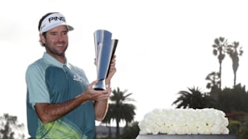PACIFIC PALISADES, CA - FEBRUARY 18: Bubba Watson poses with the trophy after winning the Genesis Open at Riviera Country Club on February 18, 2018 in Pacific Palisades, California. (Photo by Christian Petersen/Getty Images)