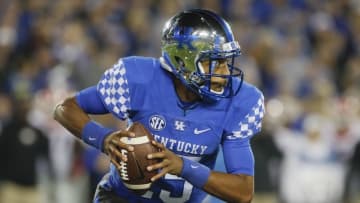 Nov 5, 2016; Lexington, KY, USA; Kentucky Wildcats quarterback Stephen Johnson (15) runs the ball against the Georgia Bulldogs in the first half at Commonwealth Stadium. Mandatory Credit: Mark Zerof-USA TODAY Sports