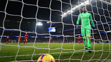 MANCHESTER, ENGLAND - JANUARY 03: Alisson of Liverpool walks to pick the ball out of his net after Manchester City scored there first goal during the Premier League match between Manchester City and Liverpool FC at the Etihad Stadium on January 3, 2019 in Manchester, United Kingdom. (Photo by Clive Brunskill/Getty Images)