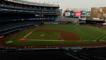 NEW YORK, NEW YORK - JULY 19: The New York Yankees and the New York Mets have a moment of silence to honor New York Post photographer Anthony J. Causi before the Summer Camp game at Yankee Stadium on July 19, 2020 in the Bronx borough of New York City.Causi, a longtime photographer and Brooklyn native, passed away from Covid-19 in April at the age of 48. (Photo by Elsa/Getty Images)