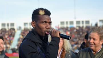 Manchester United and France midfielder Paul Pogba speaks prior to a gala football match between All Star France and Guinea at the Vallee du Cher Stadium in Tours, central France, on December 29, 2019, as part of the "48h for Guinea" charity event. (Photo by GUILLAUME SOUVANT / AFP) (Photo by GUILLAUME SOUVANT/AFP via Getty Images)