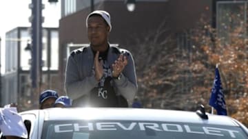 Nov 3, 2015; Kansas City, MO, USA; Kansas City Royals catcher Salvador Perez (13) waves to the crowd at the World Series Parade. Mandatory Credit: John Rieger-USA TODAY Sports
