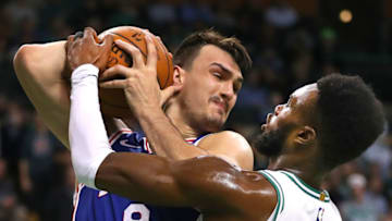 BOSTON - JANUARY 18: Philadelphia 76ers' Dario Saric grabs a rebound and gets in the face of Celtics' Jaylen Brown in the fourth quarter. The Boston Celtics host the Philadelphia 76ers in a regular season NBA basketball game at TD Garden in Boston on Jan. 18, 2018. (Photo by John Tlumacki/The Boston Globe via Getty Images)