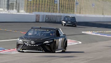 CHARLOTTE, NC - JULY 10: Denny Hamlin in the #11 car manuevers through the backstretch of The Roval during testing at Charlotte Motor Speedway on July 10, 2018 in Charlotte, North Carolina. (Photo by Bob Leverone/Getty Images)