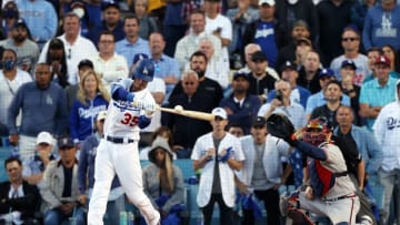 LOS ANGELES, CALIFORNIA - OCTOBER 19: Cody Bellinger #35 of the Los Angeles Dodgers hits a 3-run home run during the 8th inning of Game 3 of the National League Championship Series against the Atlanta Braves at Dodger Stadium on October 19, 2021 in Los Angeles, California. (Photo by Ronald Martinez/Getty Images)