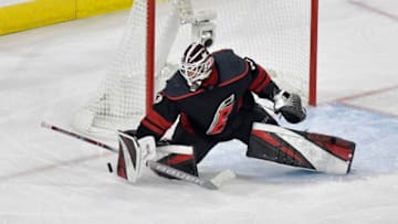 RALEIGH, NORTH CAROLINA - MAY 16: Curtis McElhinney #35 of the Carolina Hurricanes tends goal against the Boston Bruins during the third period in Game Four of the Eastern Conference Finals during the 2019 NHL Stanley Cup Playoffs at PNC Arena on May 16, 2019 in Raleigh, North Carolina. (Photo by Grant Halverson/Getty Images)