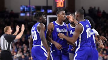 Nov 19, 2019; Spokane, WA, USA; Texas-Arlington Mavericks guard David Azore (4) huddles with his team after being fouled by Gonzaga Bulldogs in the second half at McCarthey Athletic Center. The Bulldogs won 72-66. Mandatory Credit: James Snook-USA TODAY Sports