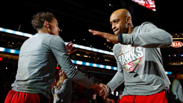 ATLANTA, GA - MARCH 09: Trae Young #11 reacts with Vince Carter #15 prior to an NBA game against the Charlotte Hornets at State Farm Arena on March 9, 2020 in Atlanta, Georgia. NOTE TO USER: User expressly acknowledges and agrees that, by downloading and/or using this photograph, user is consenting to the terms and conditions of the Getty Images License Agreement. (Photo by Todd Kirkland/Getty Images)