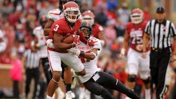Oct 24, 2015; Norman, OK, USA; Oklahoma Sooners wide receiver Sterling Shepard (3) runs through a tackle attempt by Texas Tech Red Raiders defensive back Justis Nelson (31) during the second quarter at Gaylord Family - Oklahoma Memorial Stadium. Mandatory Credit: Mark D. Smith-USA TODAY Sports