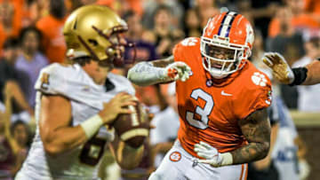Clemson defensive end Xavier Thomas (3) pressures Boston College quarterback Dennis Grosel (6) during the fourth quarter at Memorial Stadium in Clemson, S.C., October 2, 2021.Ncaa Football Acc Clemson Boston College