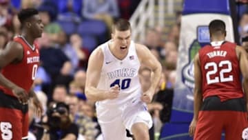Mar 12, 2015; Greensboro, NC, USA; Duke Blue Devils center Marshall Plumlee (40) reacts in the first half in the quarter finals of the ACC Tournament at Greensboro Coliseum. Mandatory Credit: Bob Donnan-USA TODAY Sports