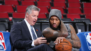 PORTLAND, OR - JANUARY 23: Portland Trail Blazers General Manager Neil Olshey talks with Damian Lillard #0 of the Portland Trail Blazers before the game against the Dallas Mavericks on January 23, 2020 at the Moda Center Arena in Portland, Oregon. NOTE TO USER: User expressly acknowledges and agrees that, by downloading and or using this photograph, user is consenting to the terms and conditions of the Getty Images License Agreement. Mandatory Copyright Notice: Copyright 2020 NBAE (Photo by Sam Forencich/NBAE via Getty Images)
